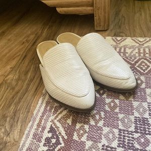 White snakeskin mules